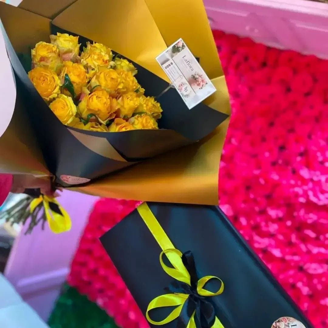 Signature Wrapped Roses by LaFlora Blooms