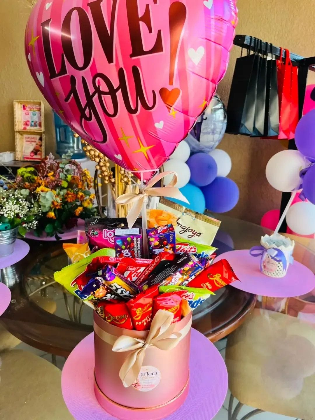 Chocolate Hat Box & Balloon by LaFlora Blooms